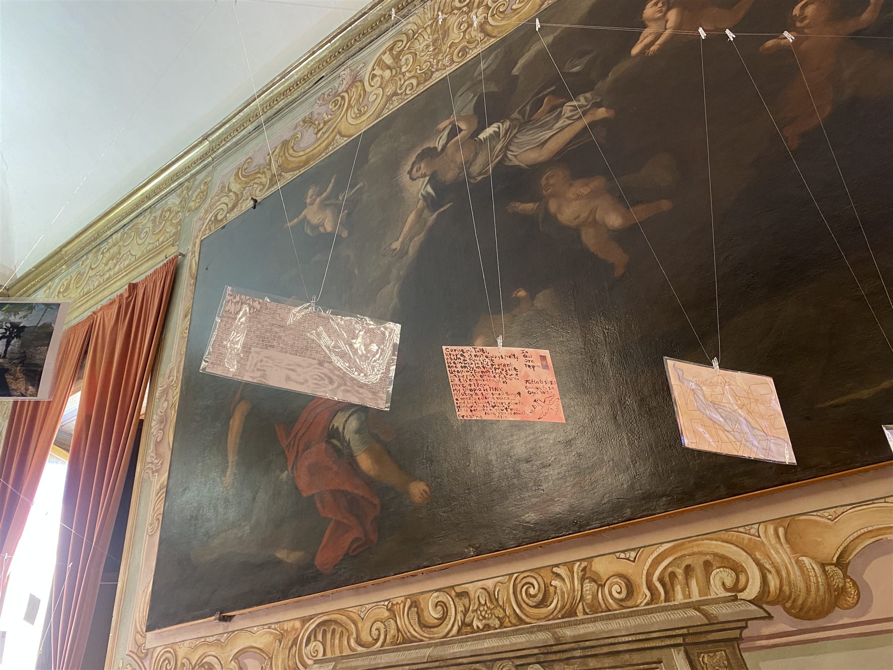 Postcards hanging in the Palazzo Gallio